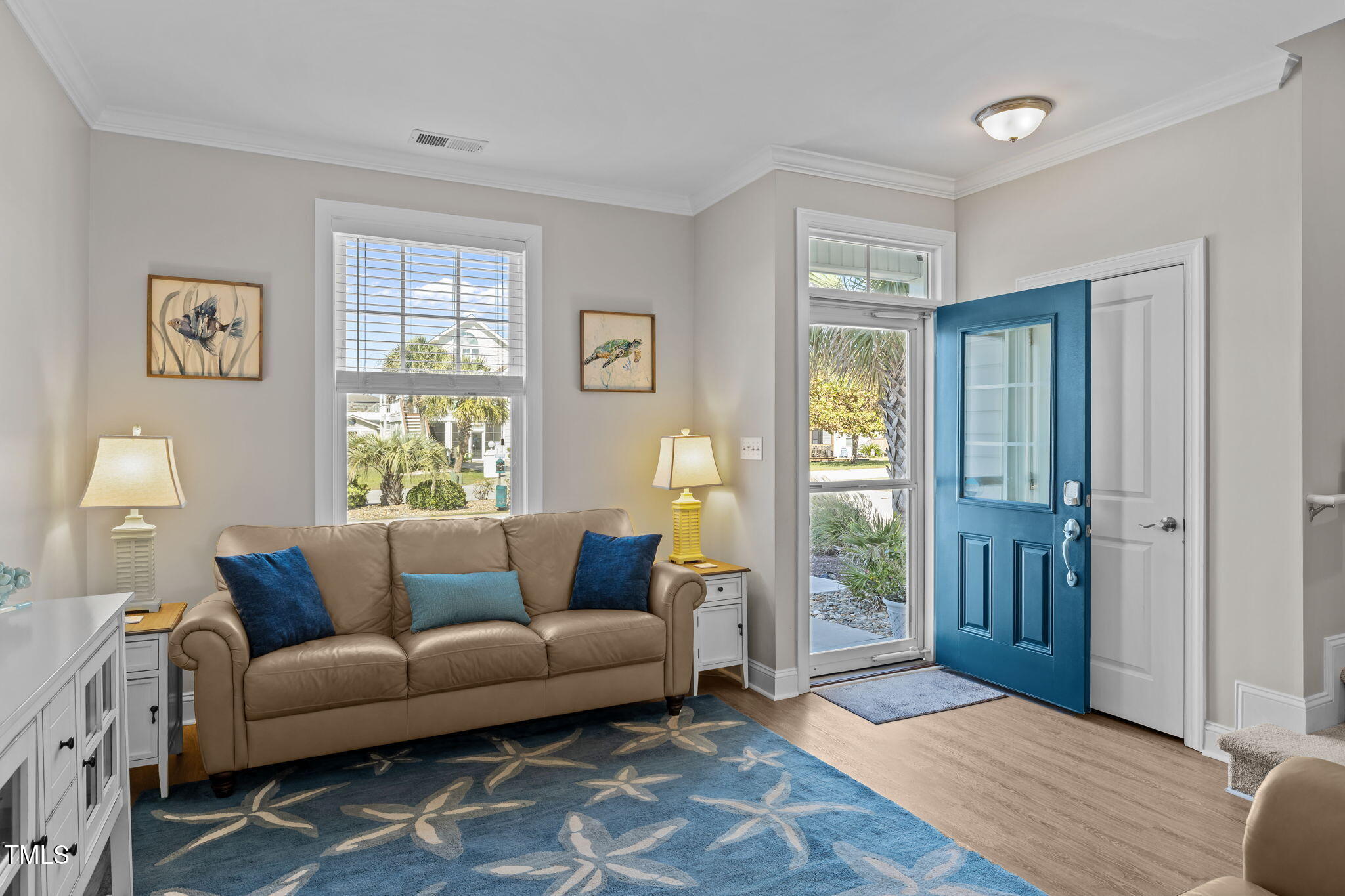 2800 West Fort Macon Road, Unit 37 Atlantic Beach, NC 28512 - Photo 4 of 39 a living room with furniture and a window
