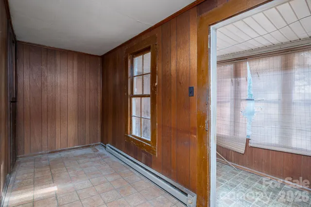 a view of an empty room and window