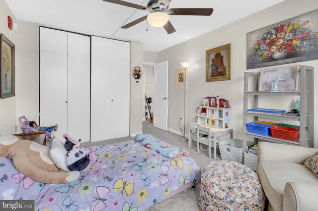 a bedroom with a bed and furniture