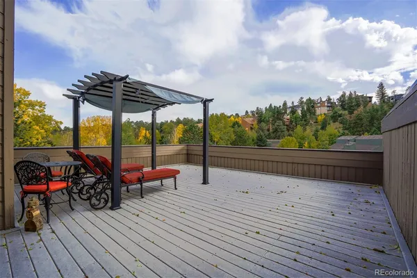 a view of roof deck with seating space