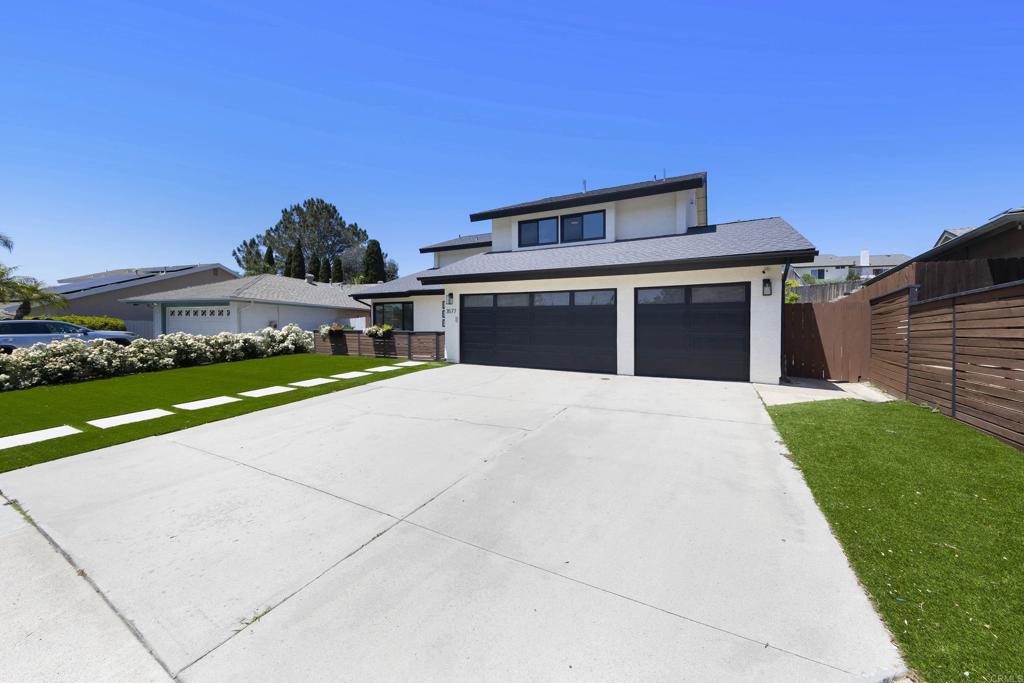 3577 Winslow Road Oceanside, CA 92056 - Photo 3 of 53 a front view of a house with a yard and garage