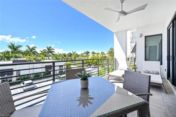 a dining room with furniture window wooden floor