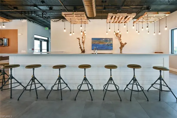a kitchen with a stove and a refrigerator