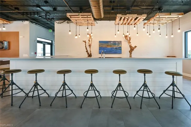 a kitchen with a stove and a refrigerator
