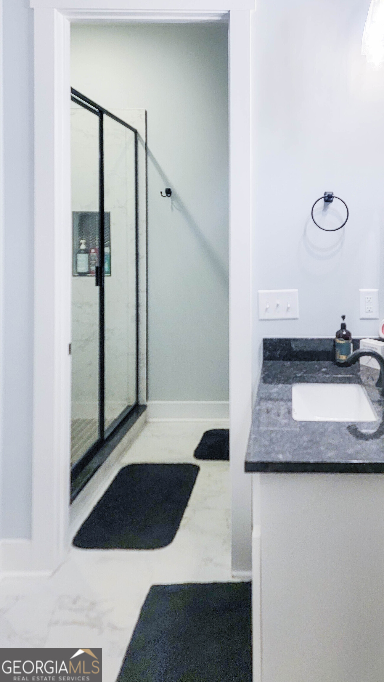 209 Lee Road Salem, AL 36874 - Photo 30 of 37 a bathroom with a sink and a mirror