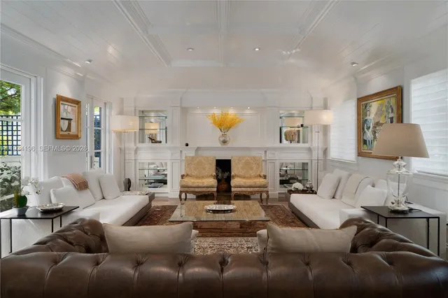 a kitchen with a sink and a fireplace