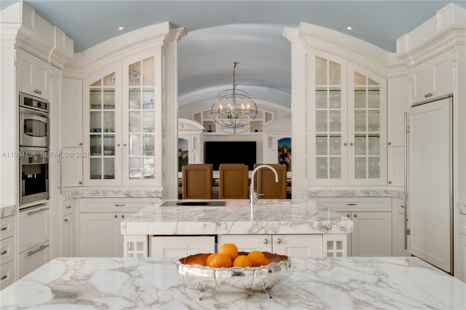 100 Cape Florida Drive Key Biscayne, FL 33149 - Photo 20 of 68 a kitchen with a sink and a fireplace