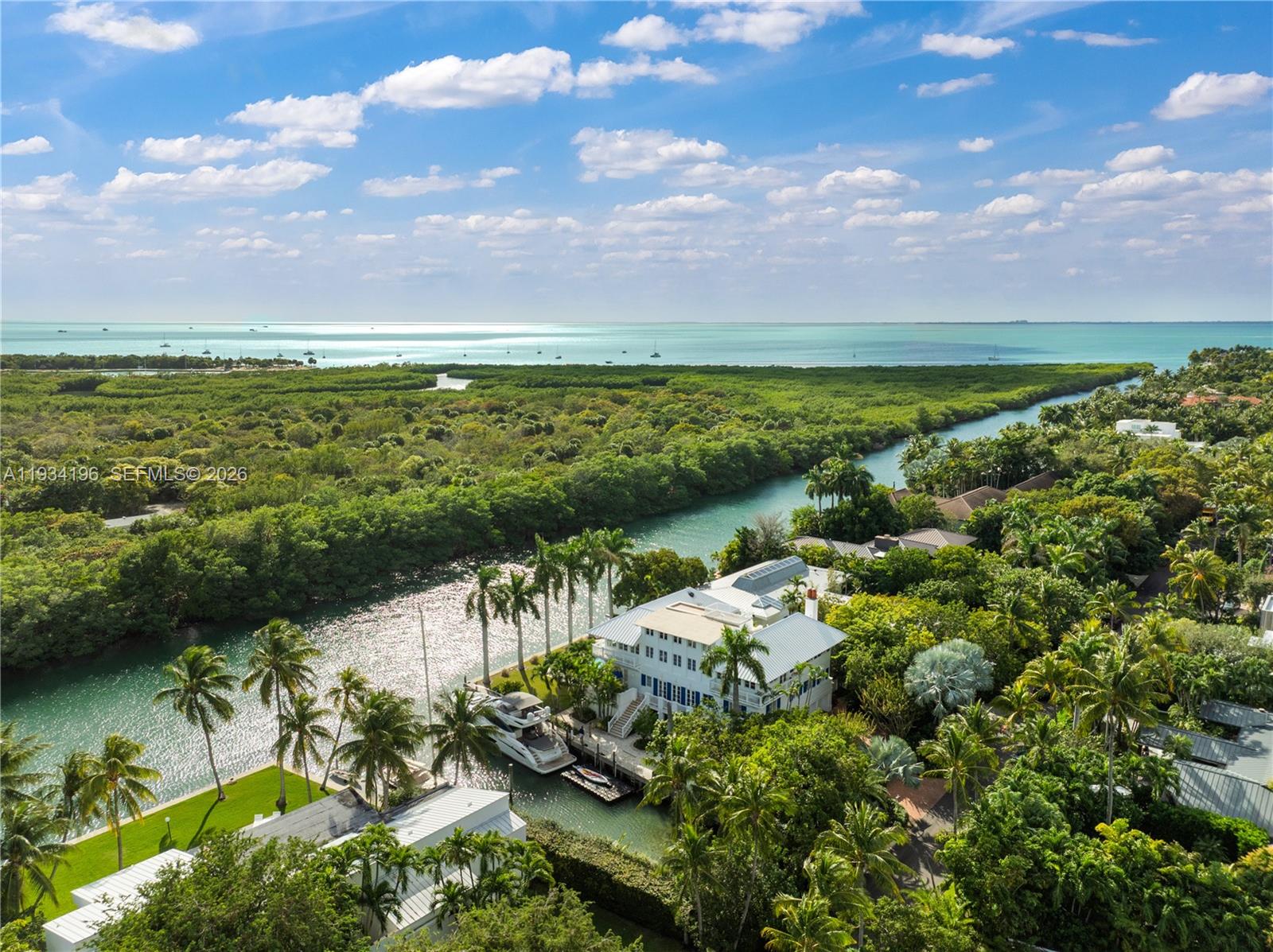 100 Cape Florida Drive Key Biscayne, FL 33149 - Photo 2 of 68 a view of a lake with houses