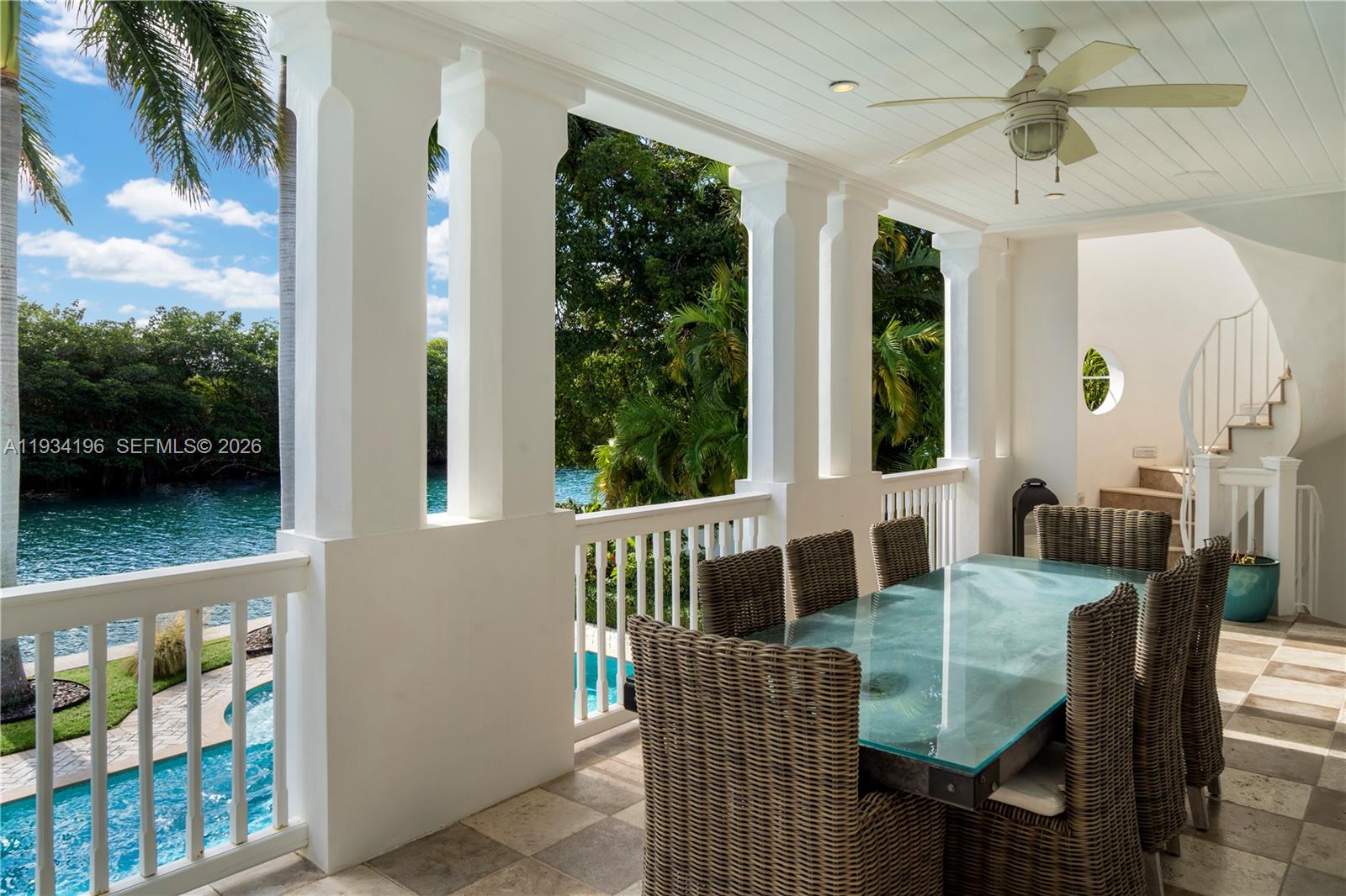 100 Cape Florida Drive Key Biscayne, FL 33149 - Photo 23 of 68 a view of a dining room with furniture window and outside view