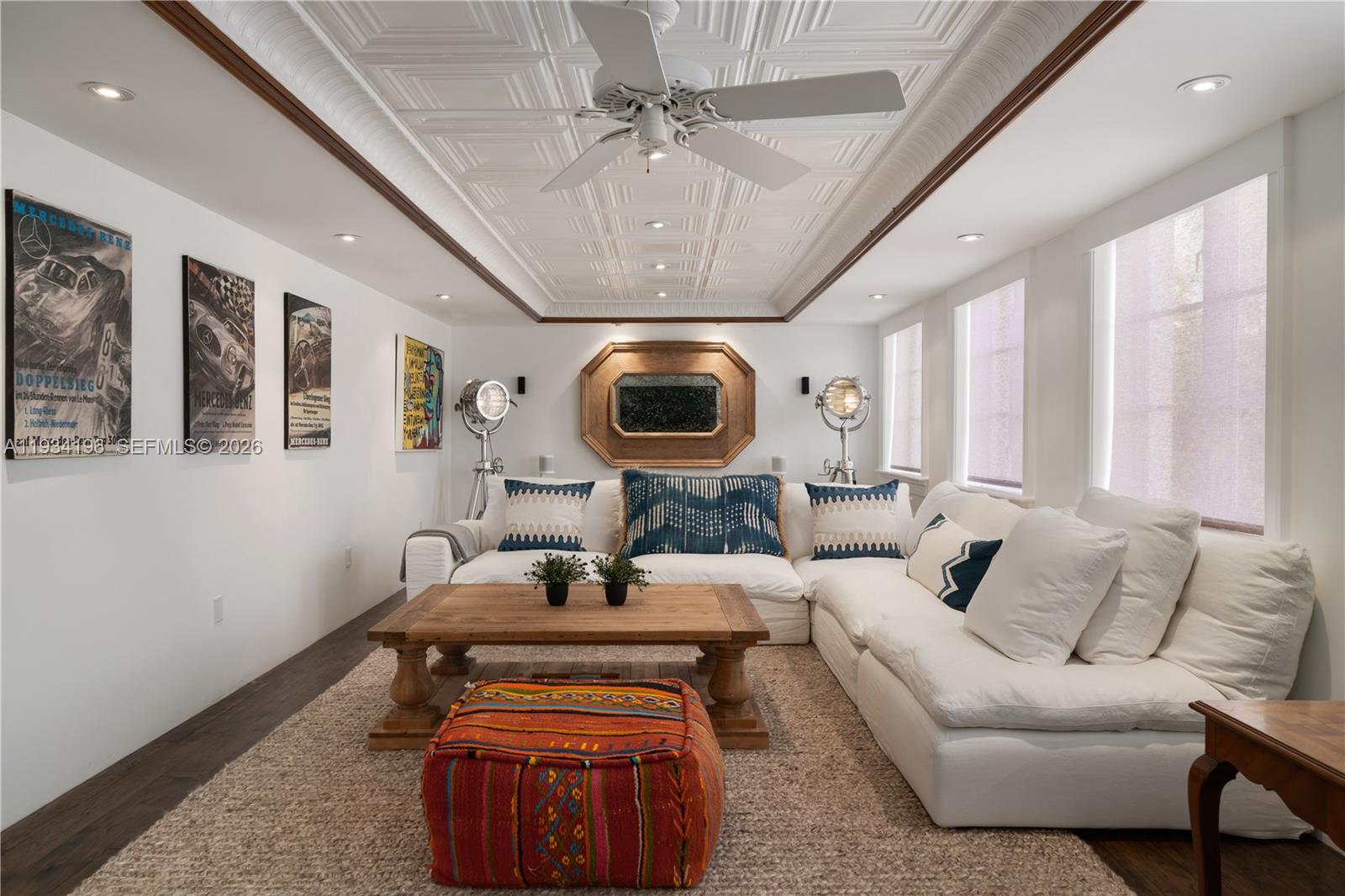 100 Cape Florida Drive Key Biscayne, FL 33149 - Photo 33 of 68 a living room with furniture and a large mirror