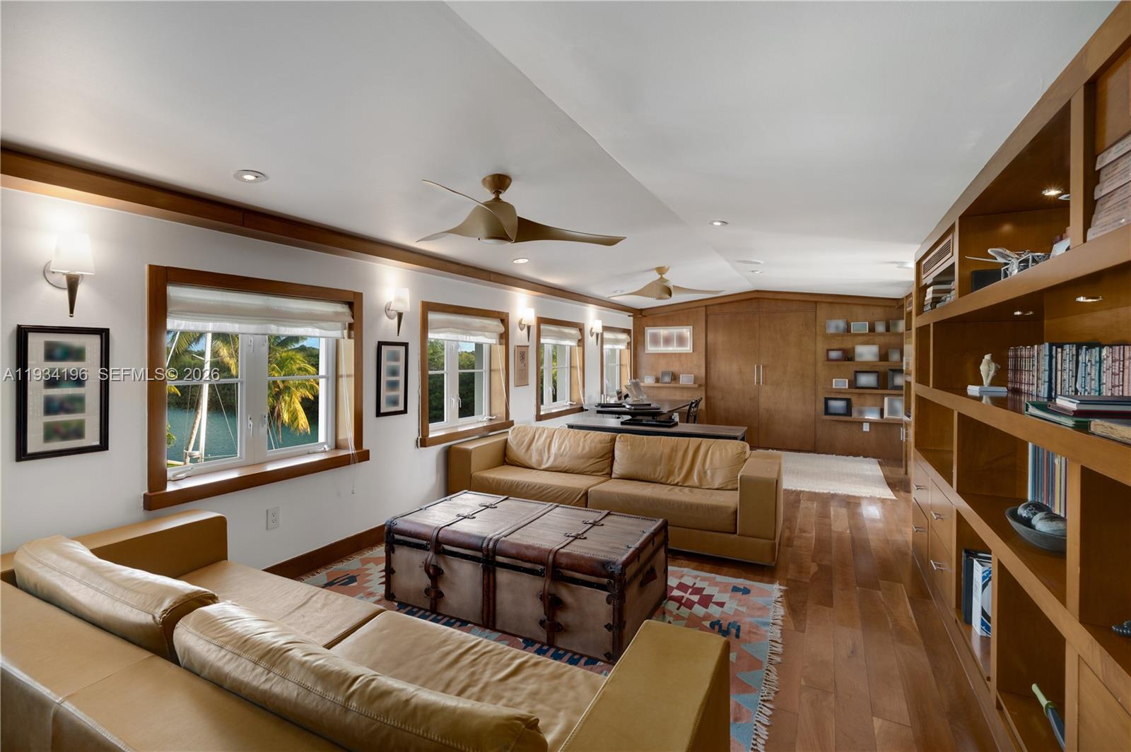 100 Cape Florida Drive Key Biscayne, FL 33149 - Photo 35 of 68 a living room with furniture and a large window