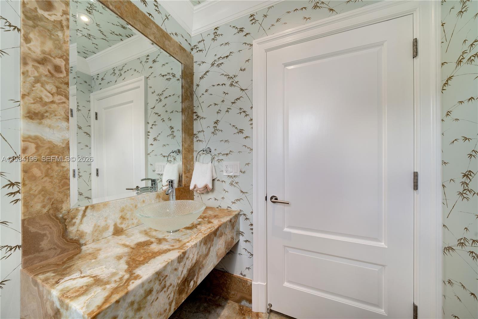 100 Cape Florida Drive Key Biscayne, FL 33149 - Photo 41 of 68 a bathroom with a tub and shower