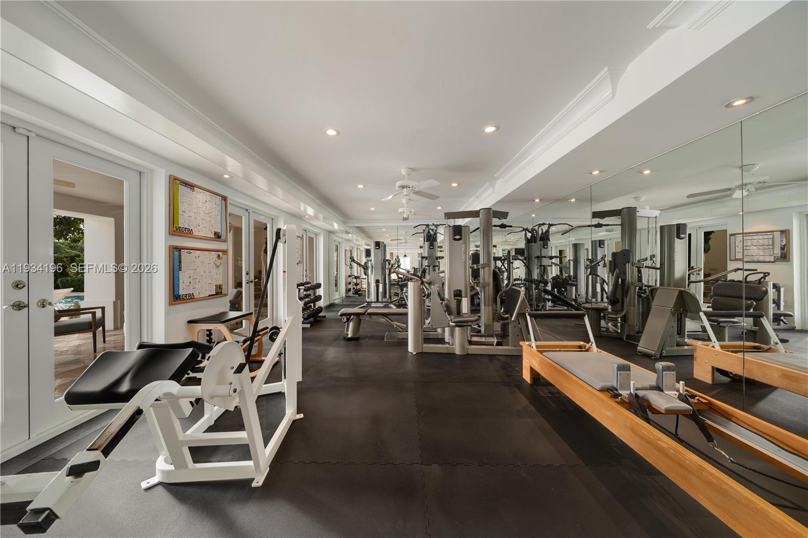 100 Cape Florida Drive Key Biscayne, FL 33149 - Photo 42 of 68 a view of a room with gym equipment