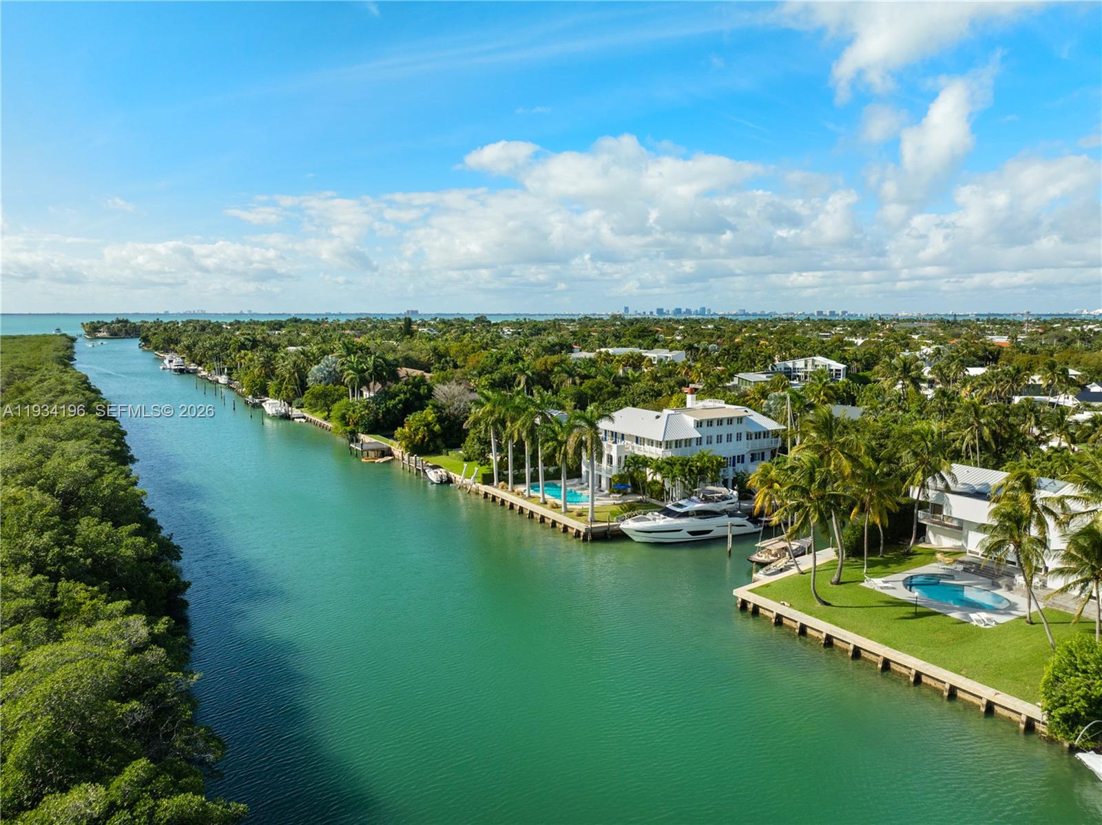100 Cape Florida Drive Key Biscayne, FL 33149 - Photo 65 of 68 a view of a city with lots of residential buildings ocean and mountain view in back