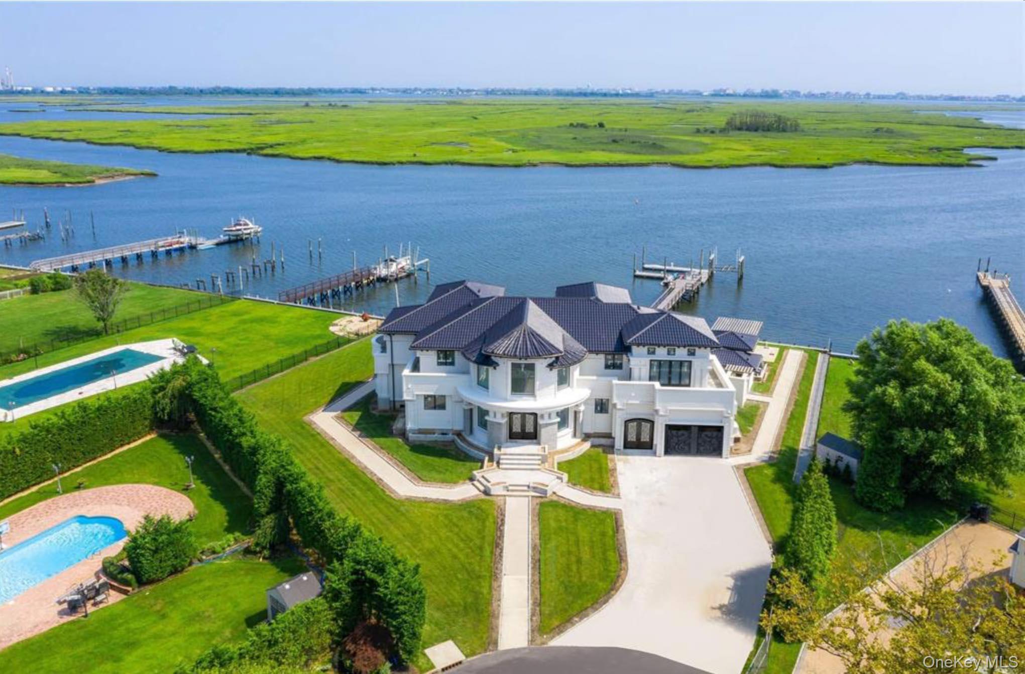 190 Curtis Road Woodmere, NY 11598 - Photo 3 of 45 View of subject property featuring a large body of water