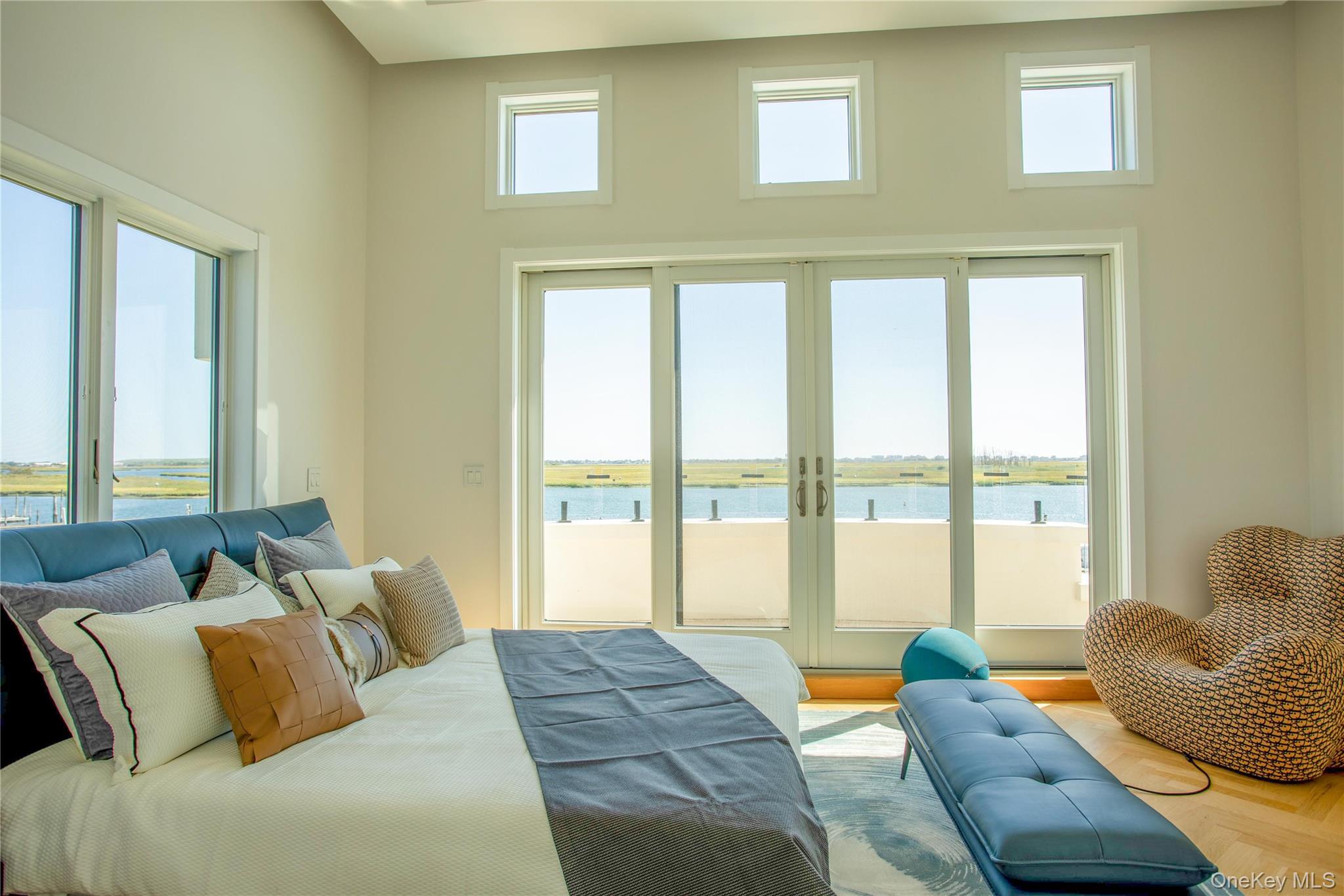 190 Curtis Road Woodmere, NY 11598 - Photo 31 of 45 Bedroom with access to outside and a water view