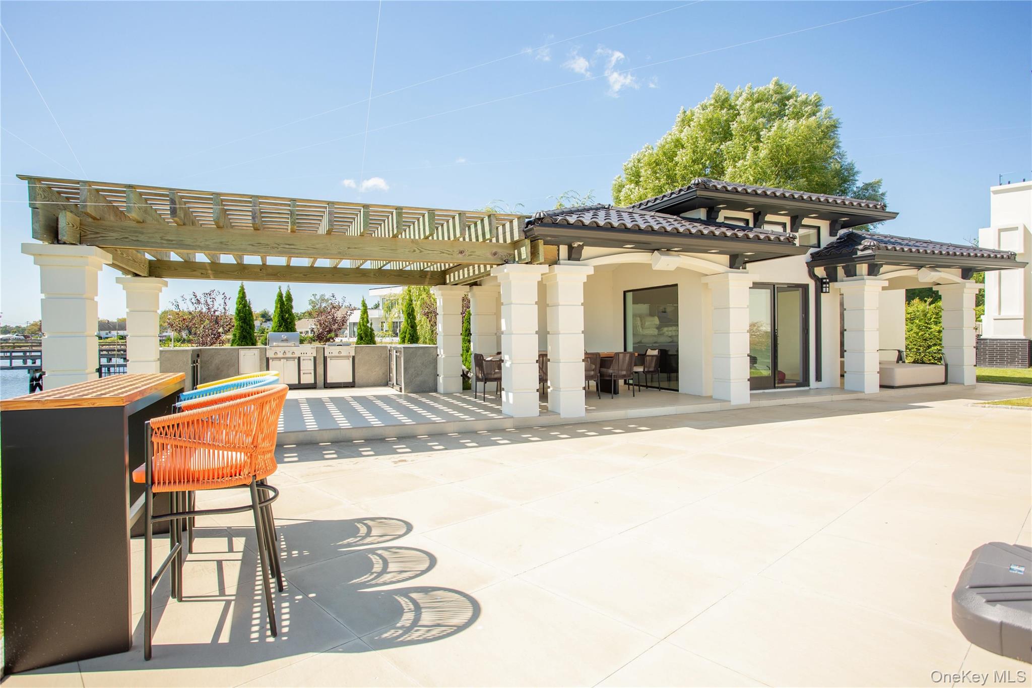 190 Curtis Road Woodmere, NY 11598 - Photo 37 of 45 View of patio / terrace featuring a pergola and exterior kitchen