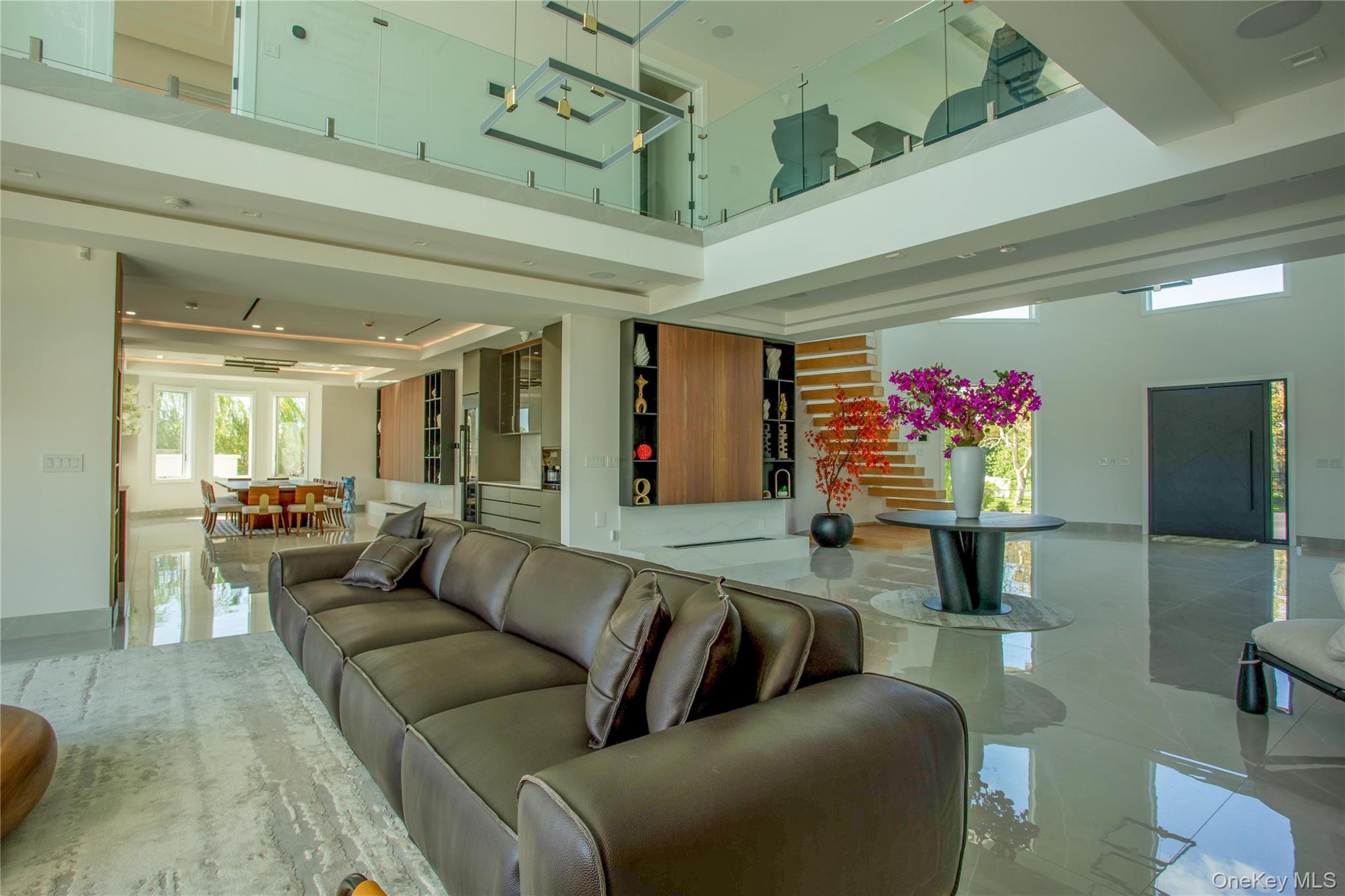 190 Curtis Road Woodmere, NY 11598 - Photo 6 of 45 Building lobby featuring stairway and a high ceiling