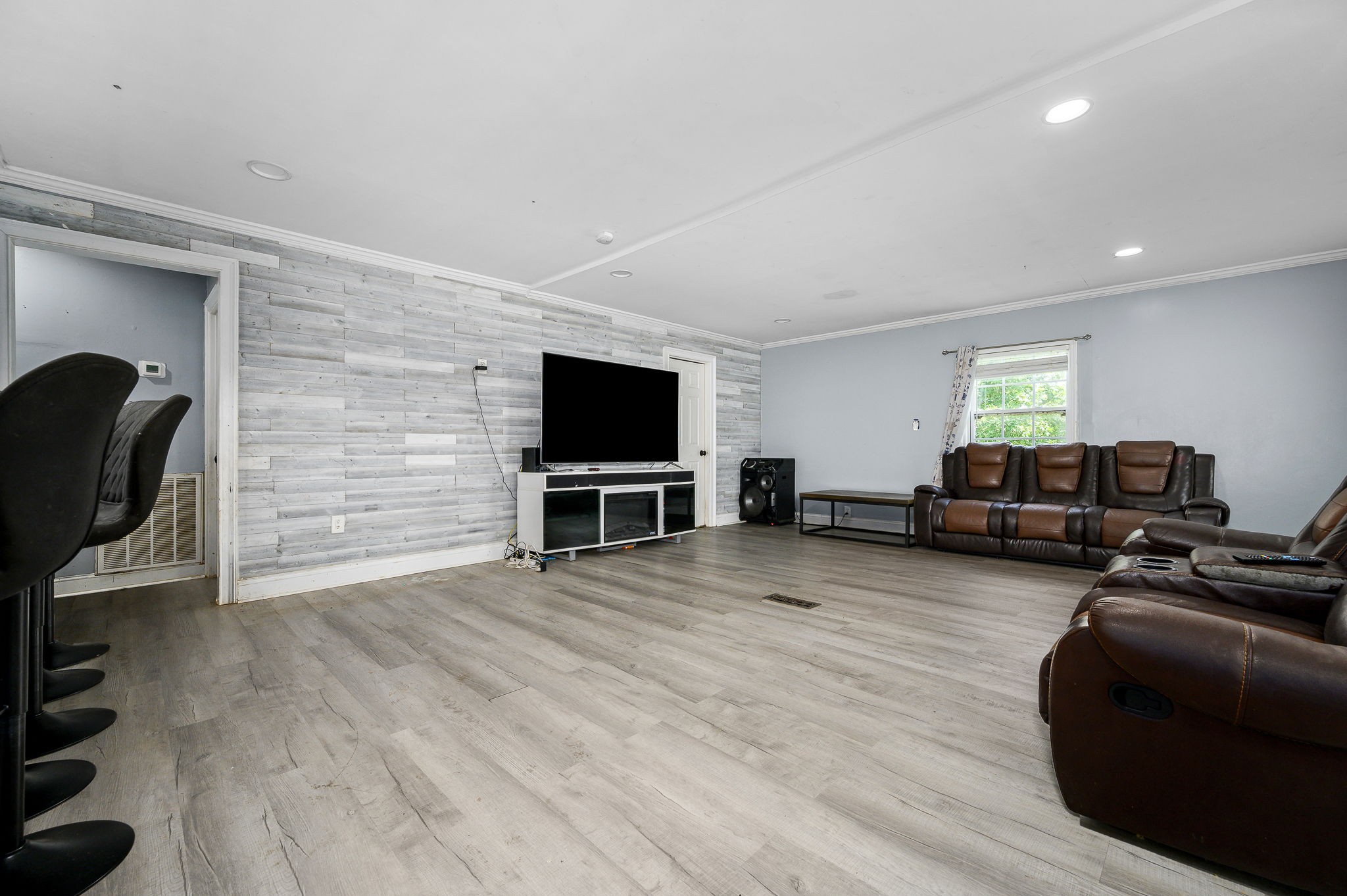 3198 Horn Springs Road Lebanon, TN 37087 - Photo 23 of 41 a living room with furniture and a flat screen tv