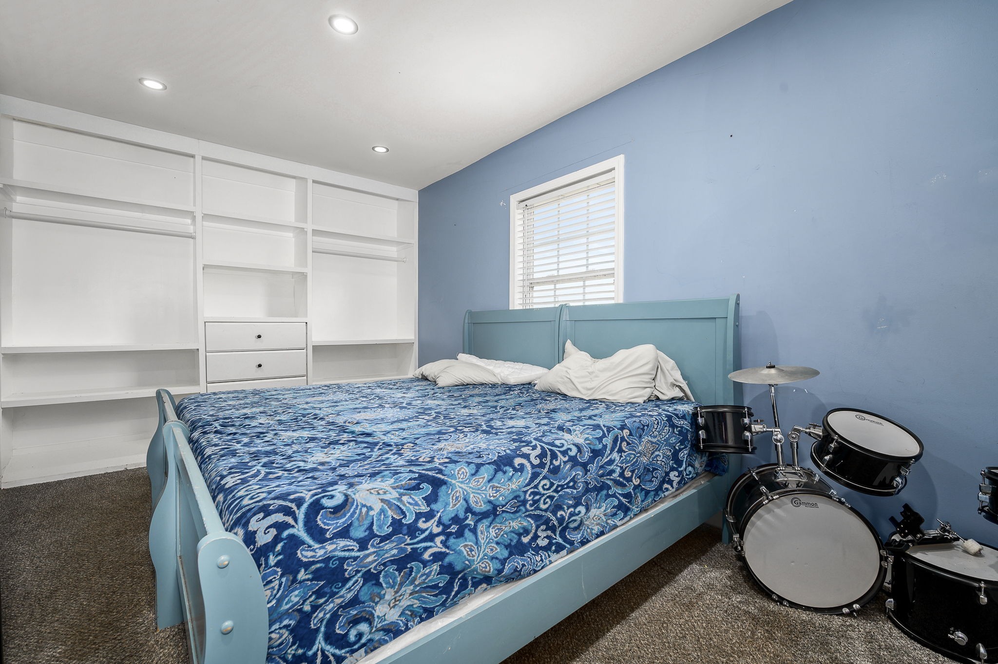 3198 Horn Springs Road Lebanon, TN 37087 - Photo 41 of 41 a bedroom with a bed and chandelier