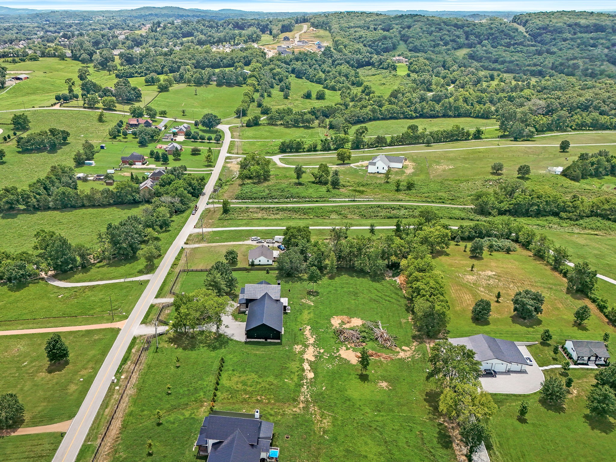 3198 Horn Springs Road Lebanon, TN 37087 - Photo 5 of 41 an aerial view of a golf course with a lake view