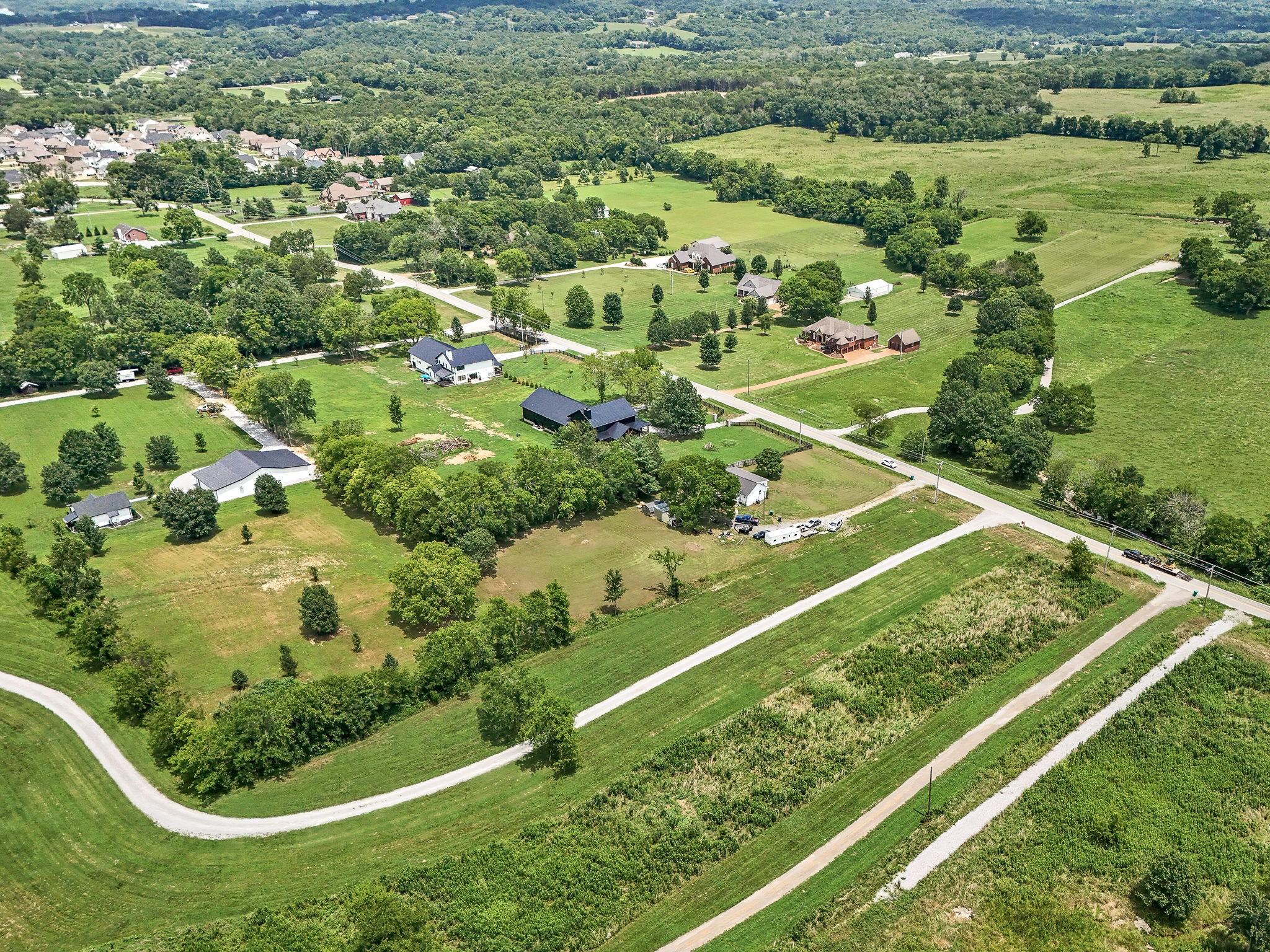3198 Horn Springs Road Lebanon, TN 37087 - Photo 8 of 41 an aerial view of residential houses with outdoor space and trees