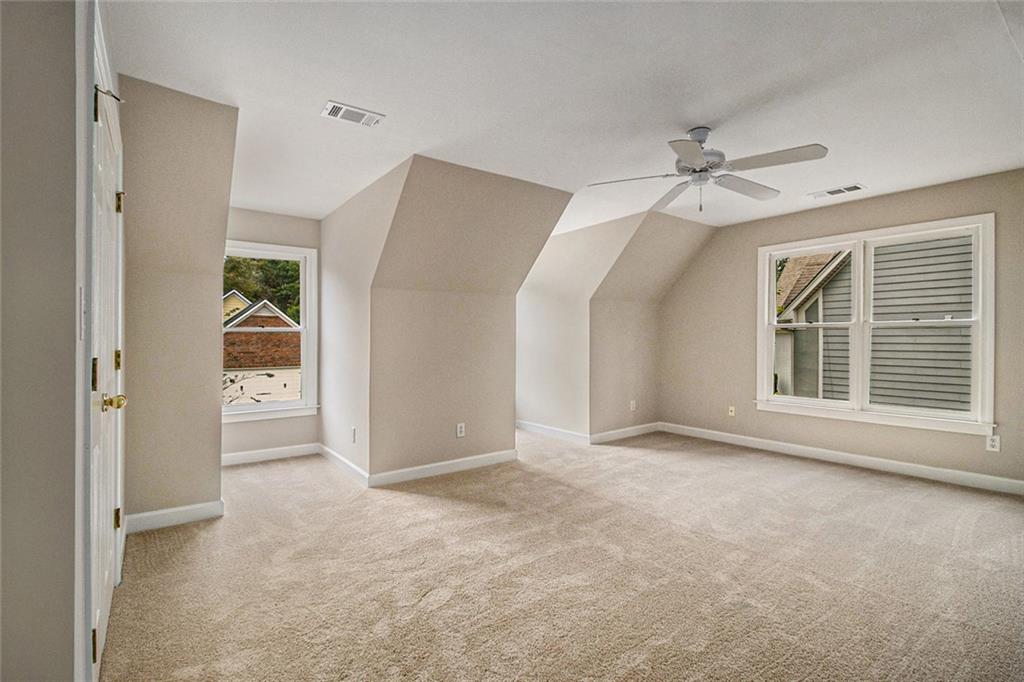1463 Crescent Walk Decatur, GA 30033 - Photo 19 of 28 a view of an empty room with a window