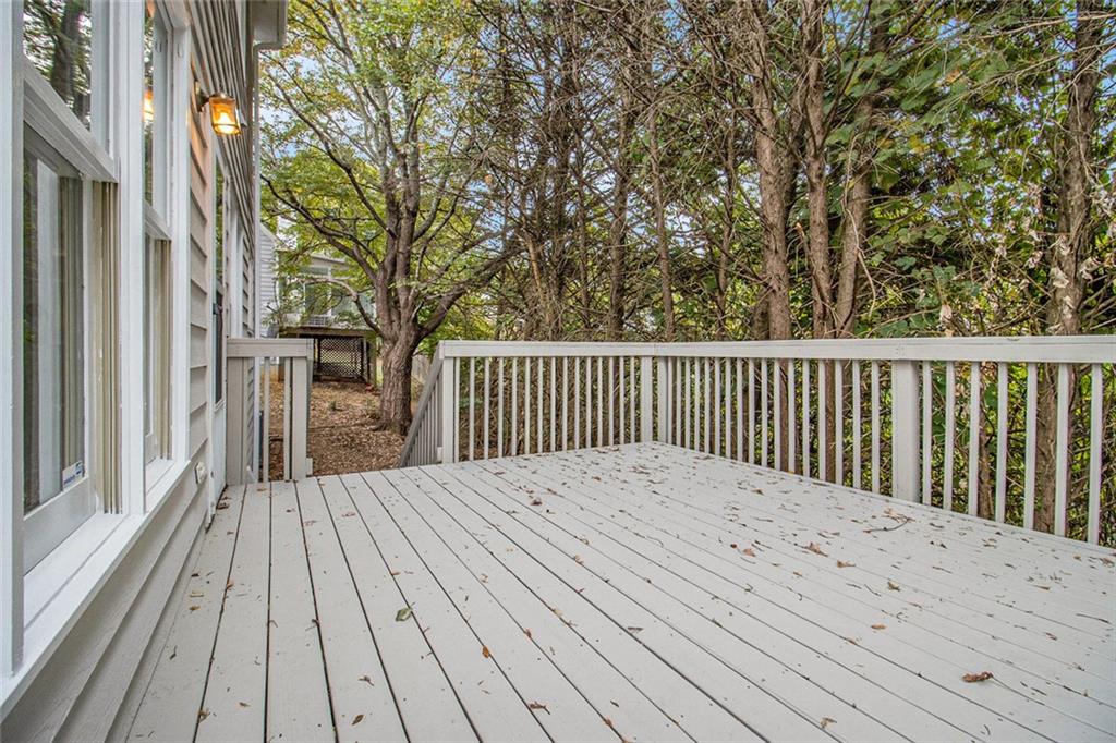 1463 Crescent Walk Decatur, GA 30033 - Photo 22 of 28 a view of backyard with a deck and wooden floor