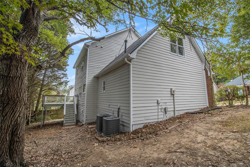 1463 Crescent Walk Decatur, GA 30033 - Photo 24 of 28 a view of a house with a yard and garage