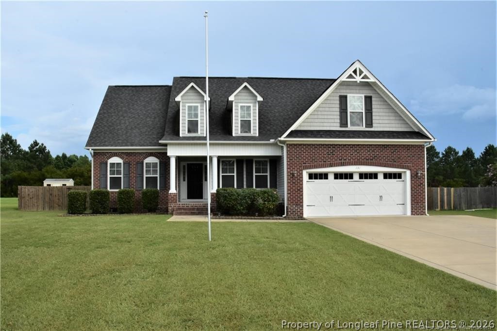 131 South Prince Henry Way Cameron, NC 28326 - Photo 1 of 26 a front view of a house with a yard