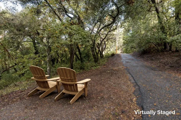 a view of a bench in a backyard