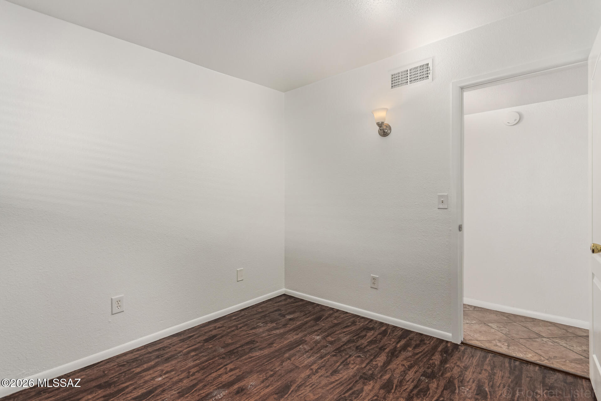 17 East Los Reales Road Tucson, AZ 85756 - Photo 16 of 27 a view of a small space with wooden floor