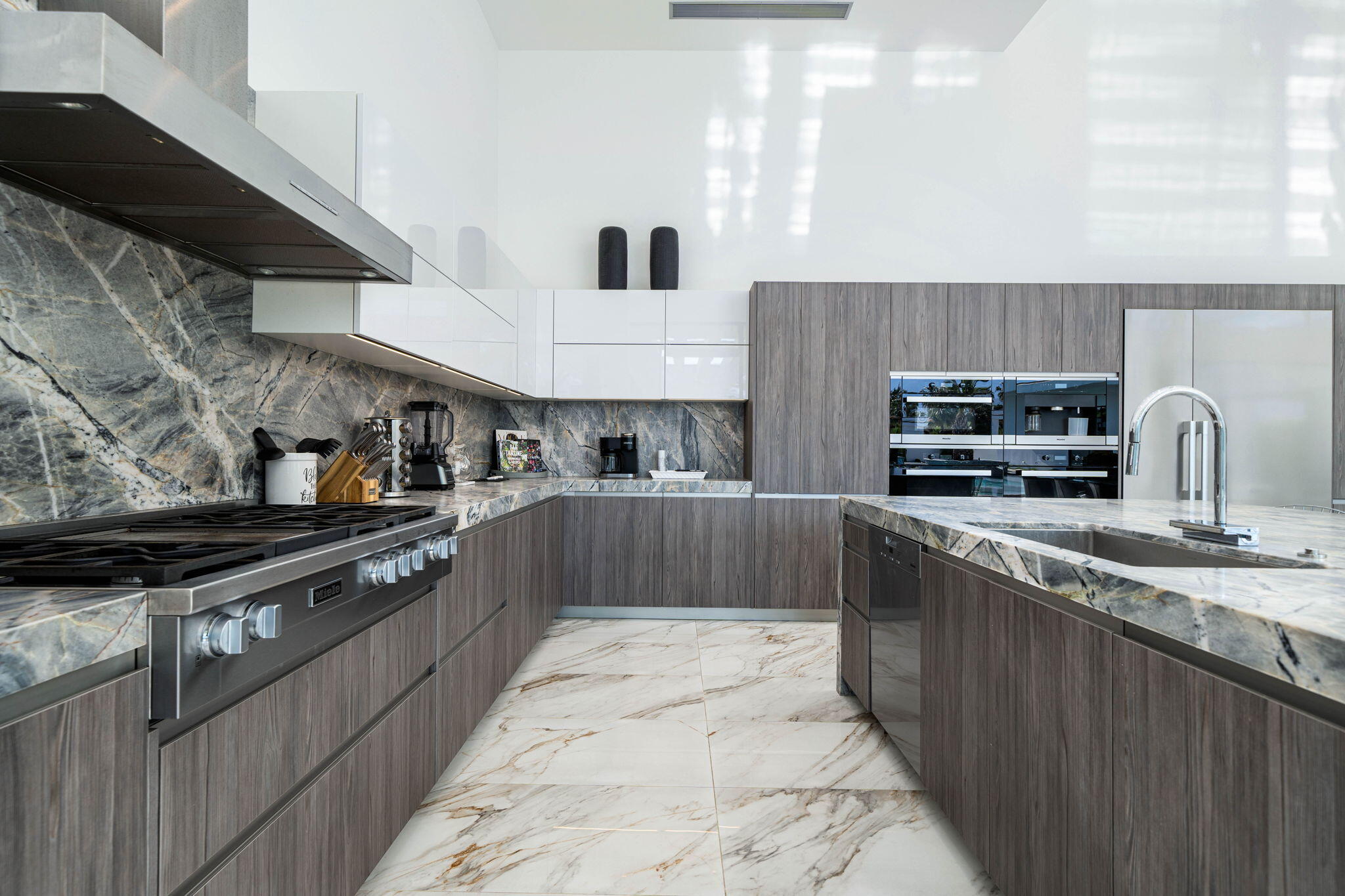 4 Bravo Court Rancho Mirage, CA 92270 - Photo 27 of 51 a kitchen with stainless steel appliances granite countertop a sink and a stove