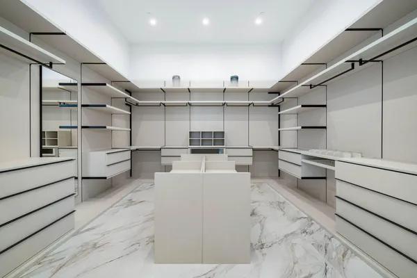 a bathroom with a double vanity sink mirror and