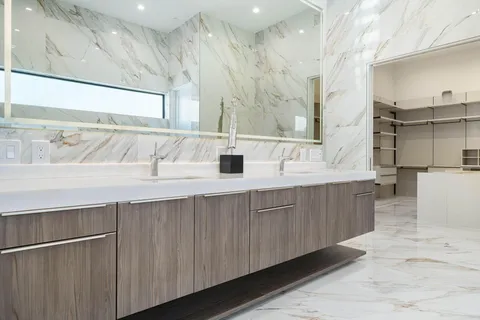 a bathroom with a bathtub and a sink