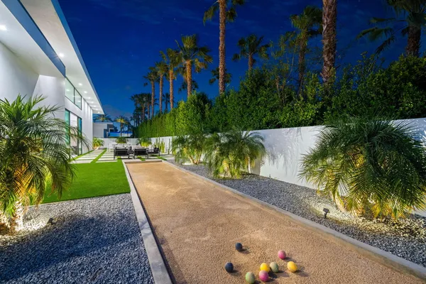 a view of a swimming pool with a patio