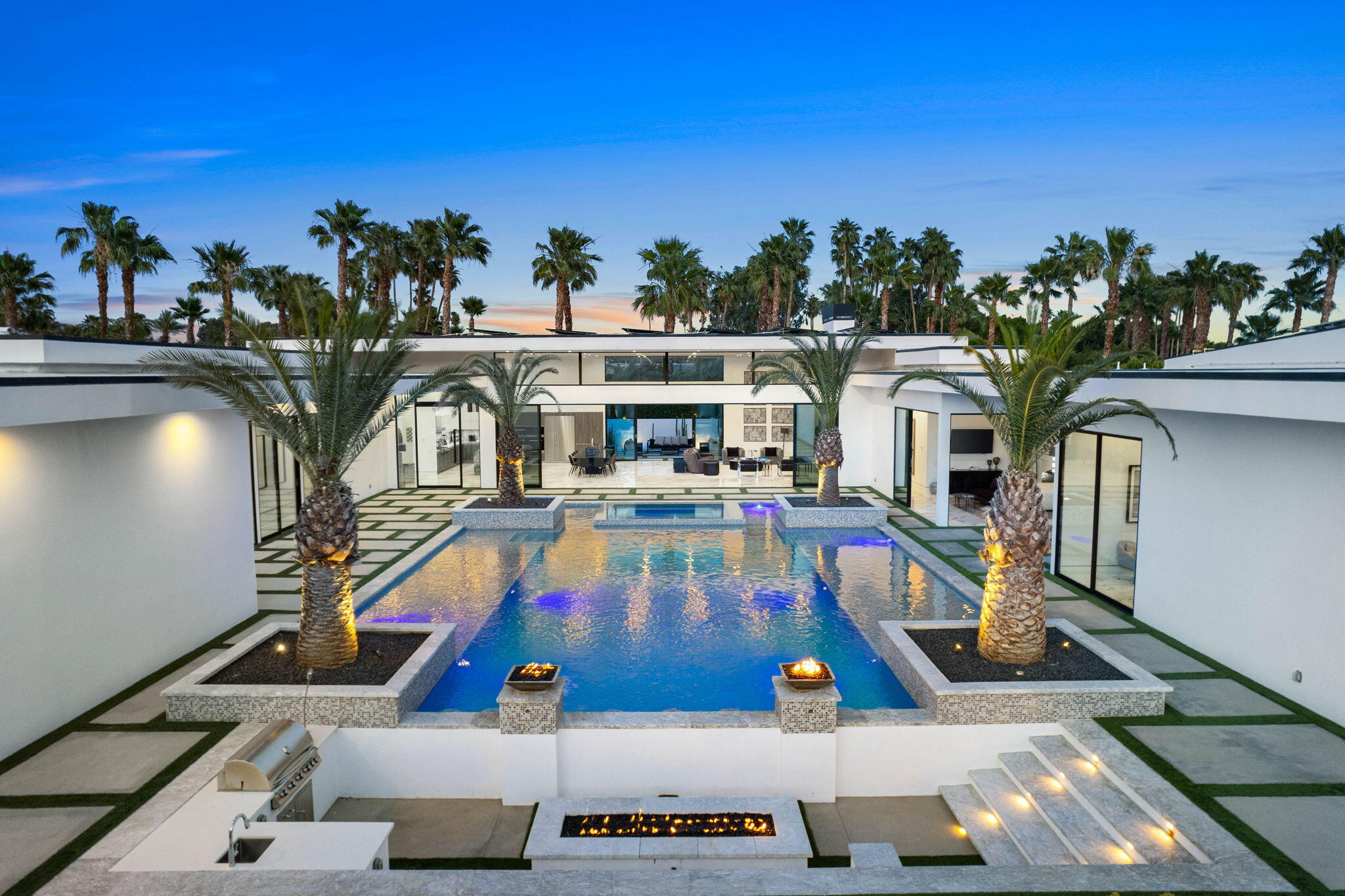 4 Bravo Court Rancho Mirage, CA 92270 - Photo 48 of 51 a view of a swimming pool with a patio