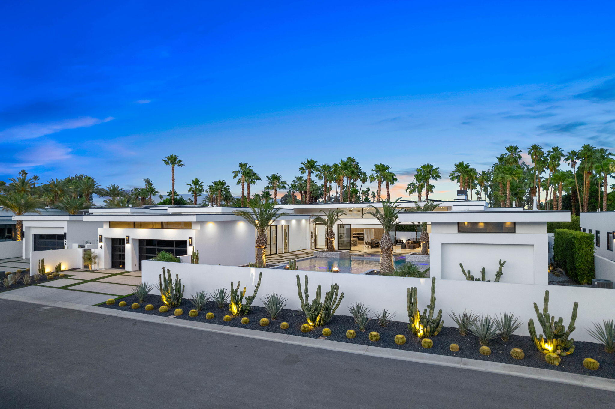 4 Bravo Court Rancho Mirage, CA 92270 - Photo 51 of 51 a front view of a house with a yard and trees
