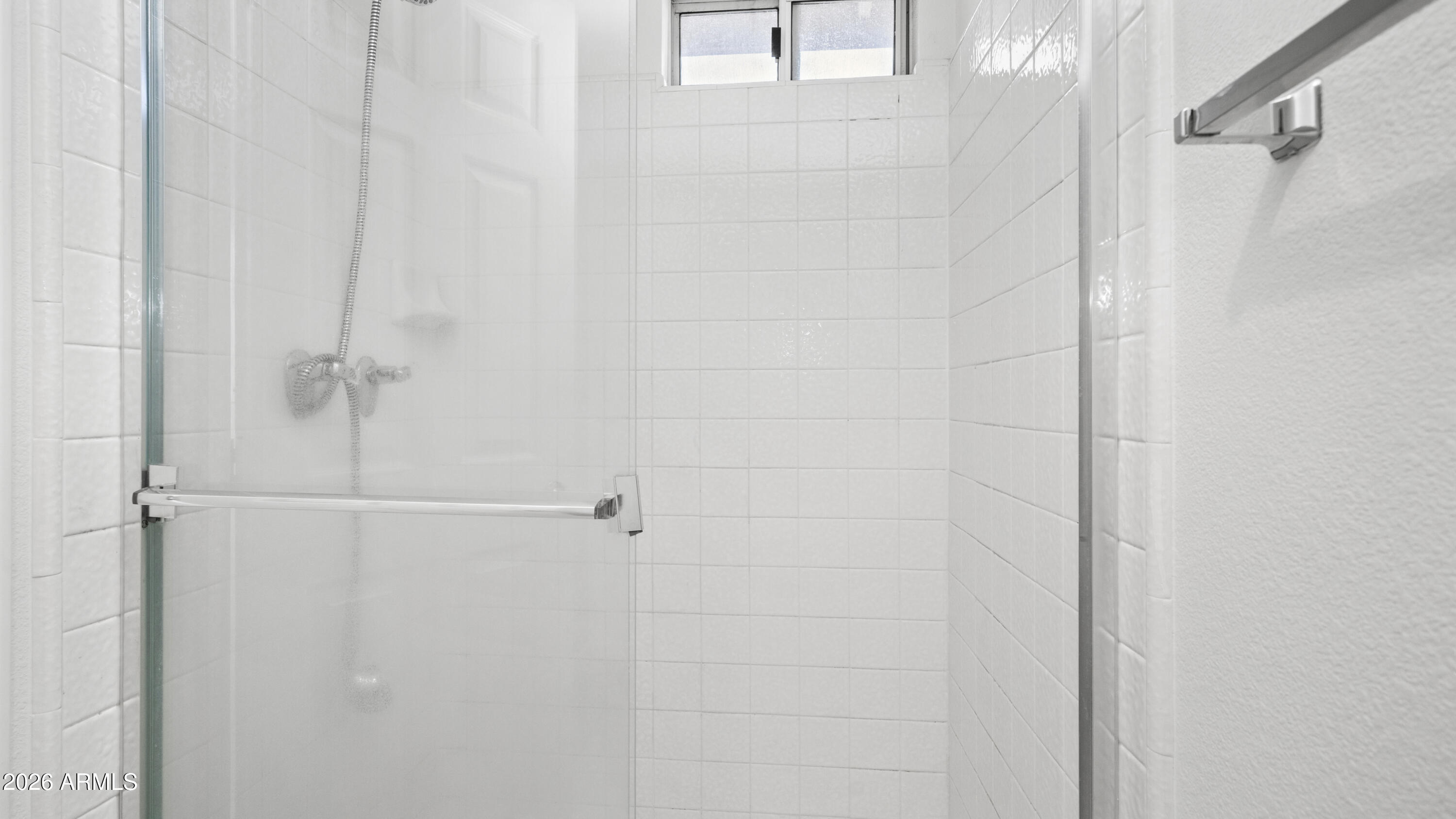 6620 West Redfield Road Glendale, AZ 85306 - Photo 31 of 33 a bathroom with a shower