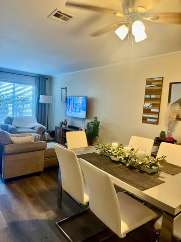 a living room with furniture and window