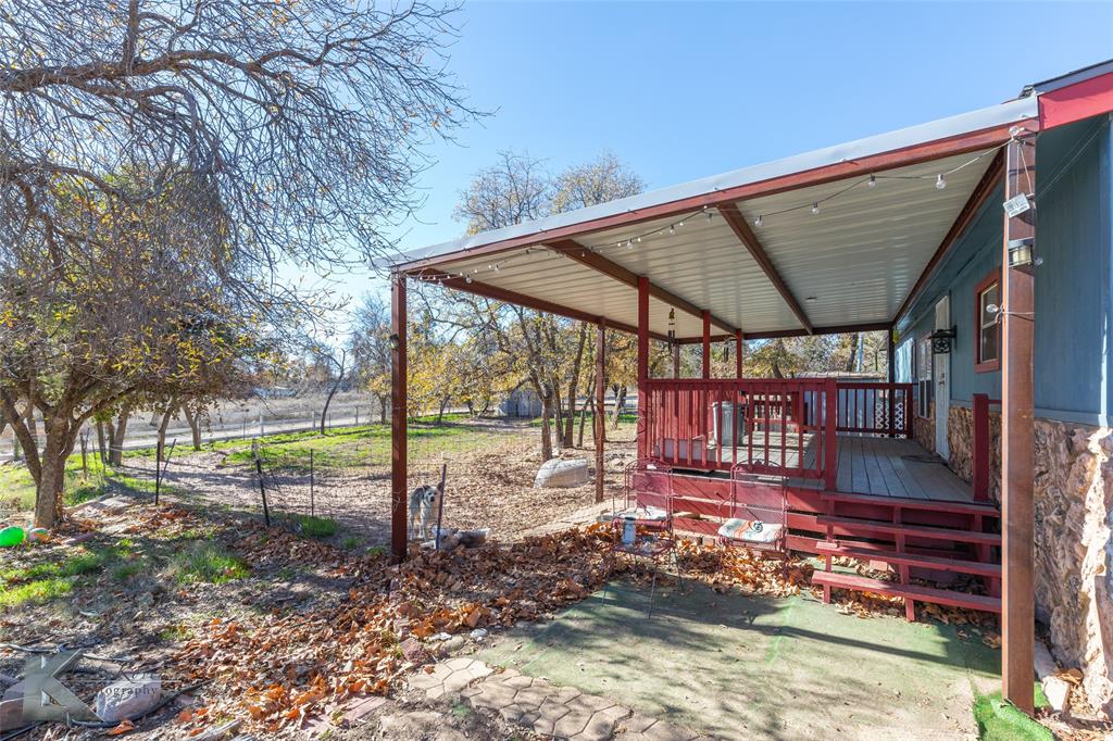 10001 County Road 379 Hawley, TX 79525 - Photo 36 of 39 a view of a house with a yard