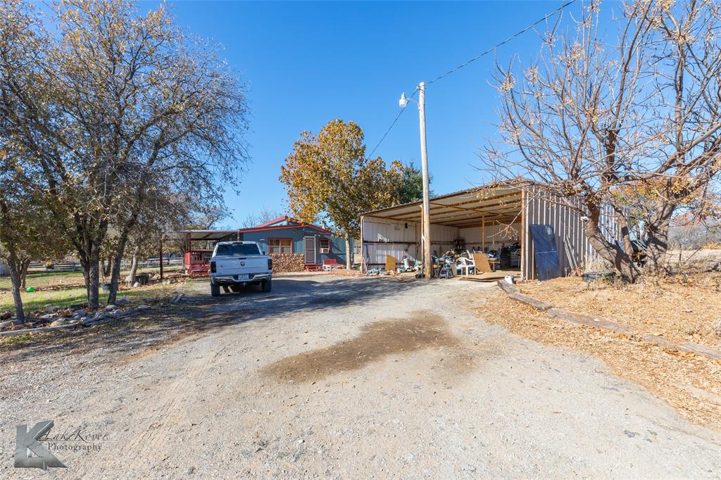 10001 County Road 379 Hawley, TX 79525 - Photo 38 of 39 a car parked in front of a house