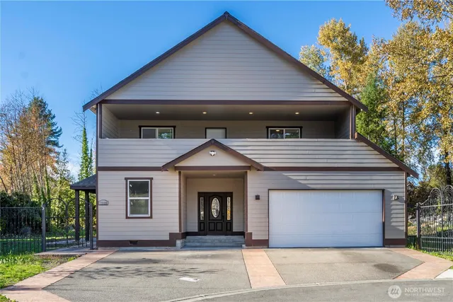 a view of a wrought iron fences in front of house