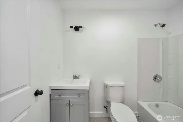 a view of a living room and hallway