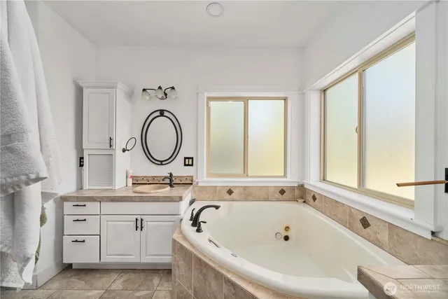 a living room with furniture window and a table