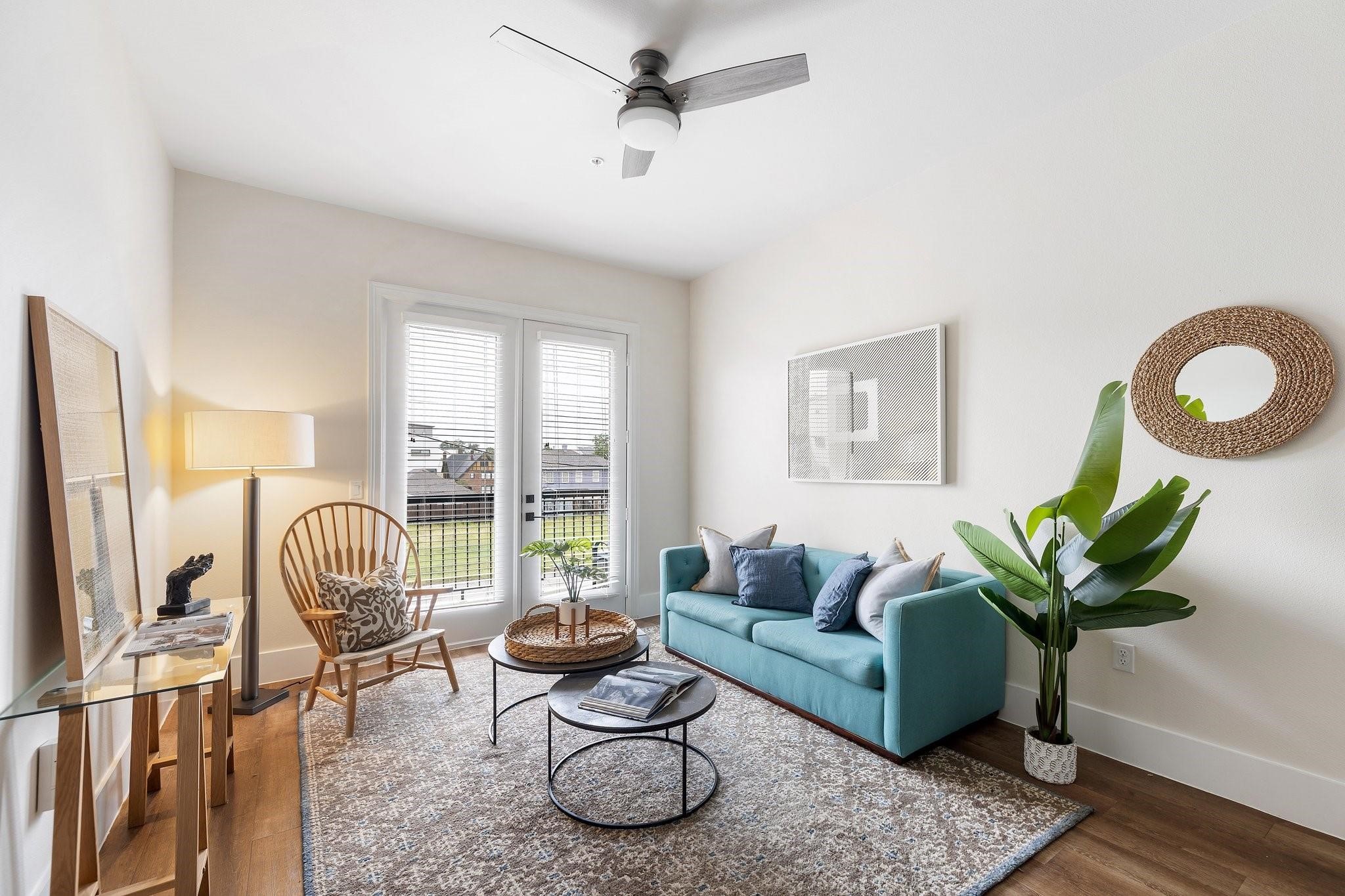 1508 Blodgett Street, Unit 503 Houston, TX 77004 - Photo 11 of 14 a living room with furniture and a window