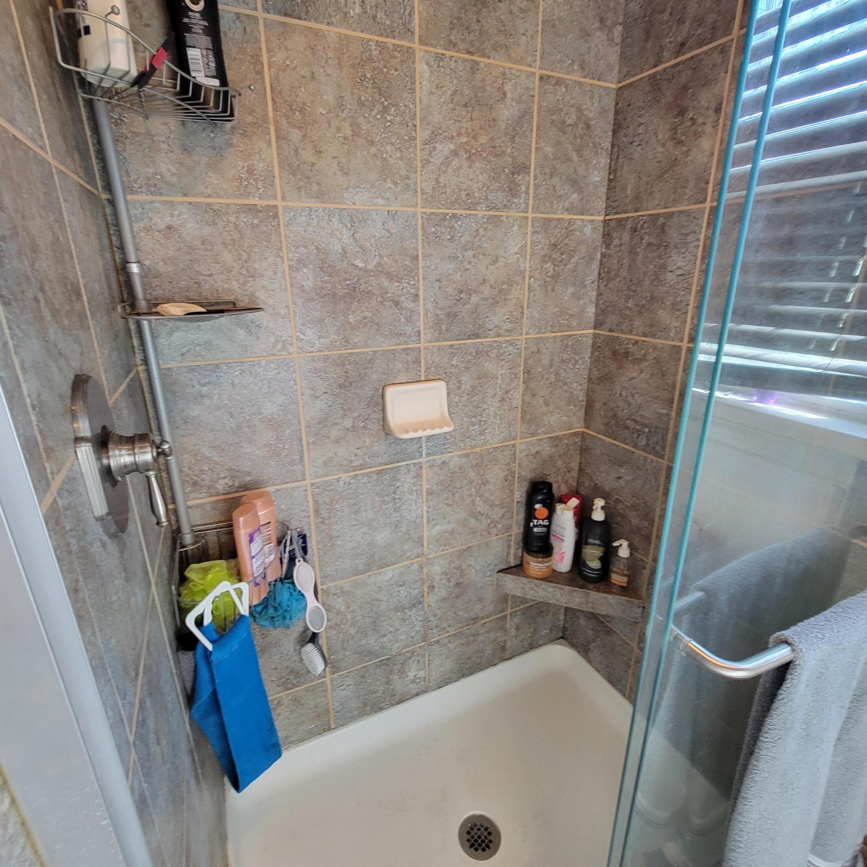 145 Whitten Street Rocky Mount, VA 24151 - Photo 13 of 19 a bathroom with a tub and sink