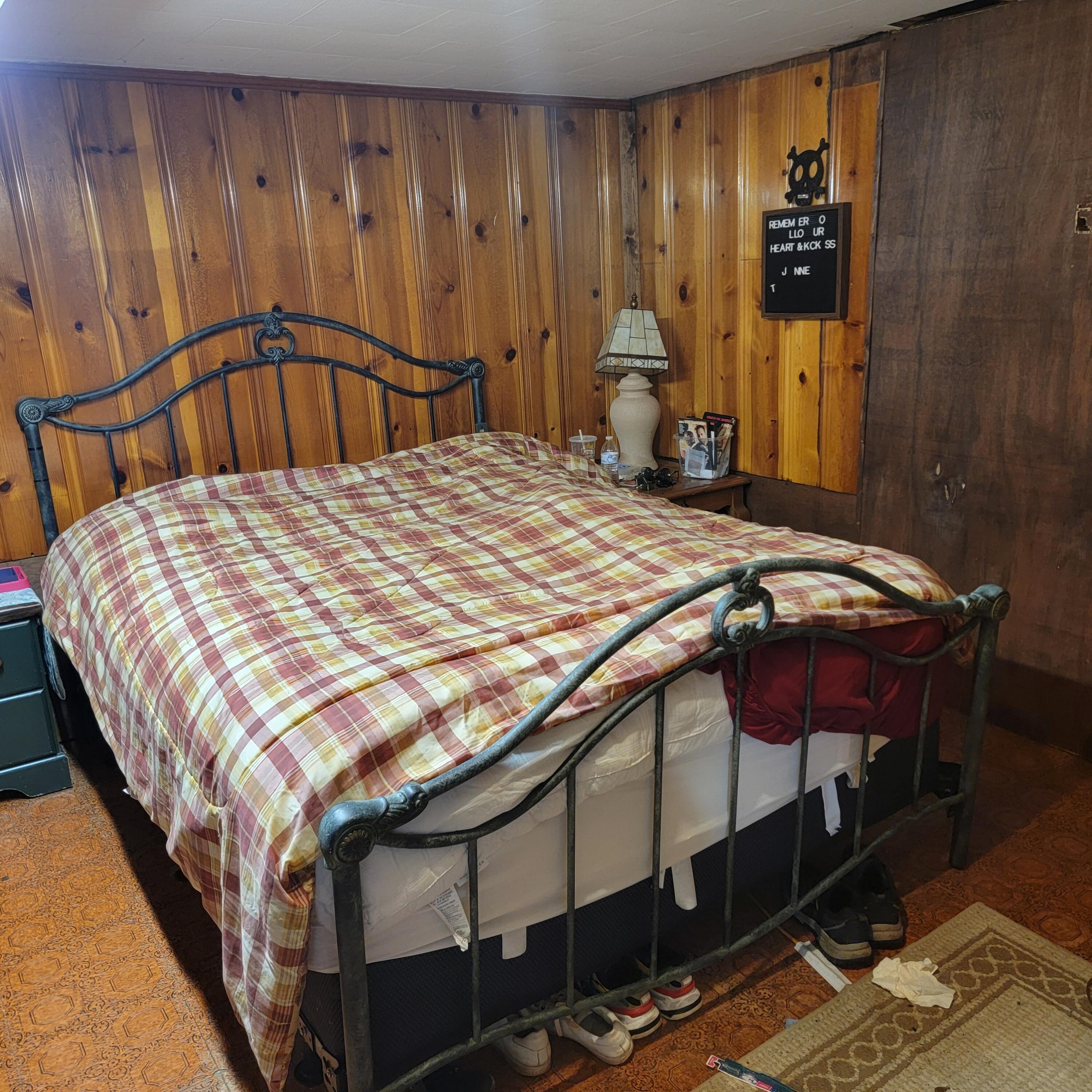 145 Whitten Street Rocky Mount, VA 24151 - Photo 17 of 19 a bed sitting in a bedroom next to a window