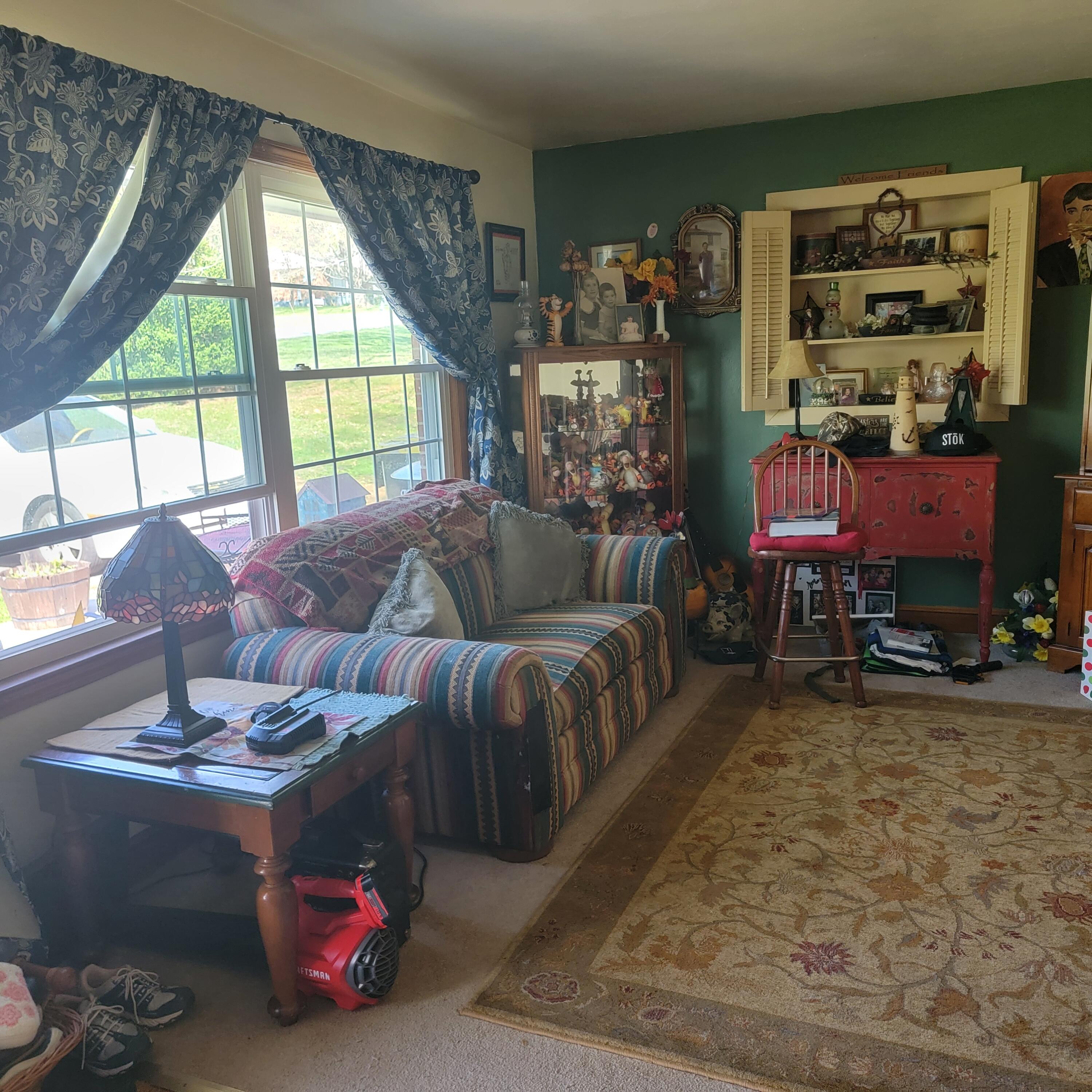 145 Whitten Street Rocky Mount, VA 24151 - Photo 2 of 19 a living room with furniture and a window