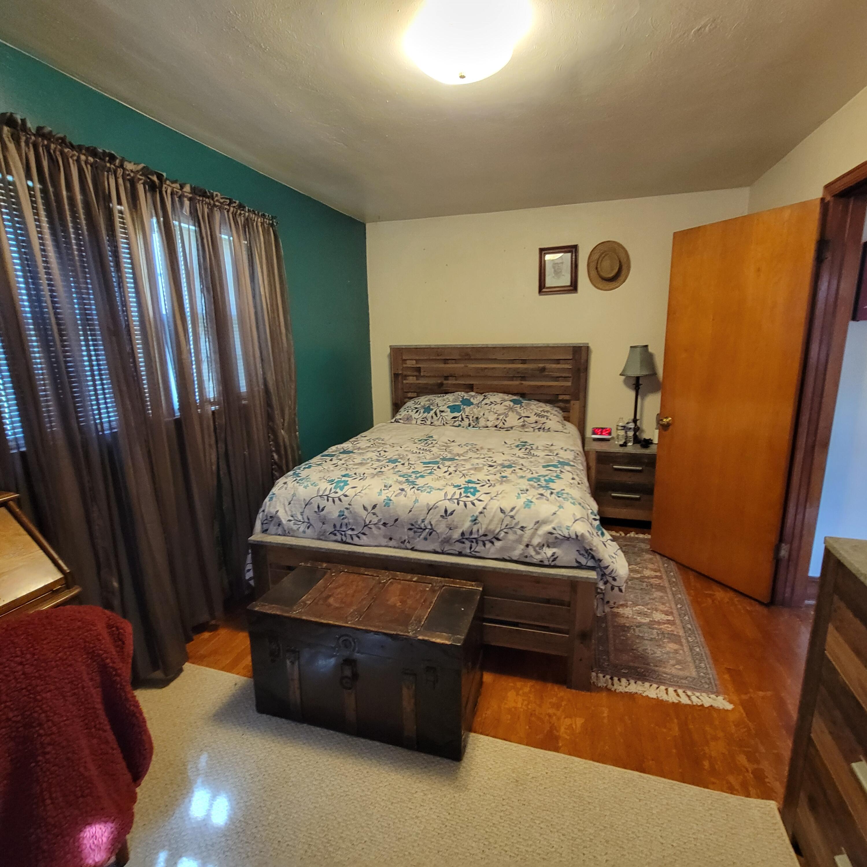 145 Whitten Street Rocky Mount, VA 24151 - Photo 9 of 19 a bed sitting in a room next to a window
